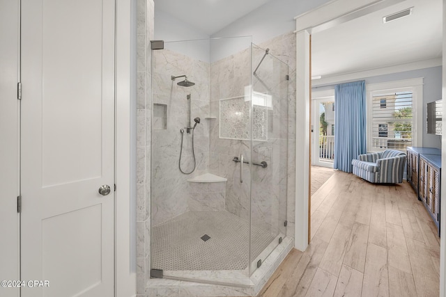 93 Emerald Cove Ln, Inlet Beach, FL 32461 - bathroom featuring visible vents, wood finished floors, and a shower stall