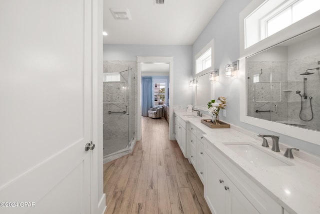 93 Emerald Cove Ln, Inlet Beach, FL 32461 - bathroom featuring a sink, double vanity, and a stall shower