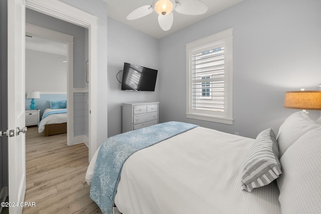93 Emerald Cove Ln, Inlet Beach, FL 32461 - bedroom featuring baseboards, a ceiling fan, and wood finished floors