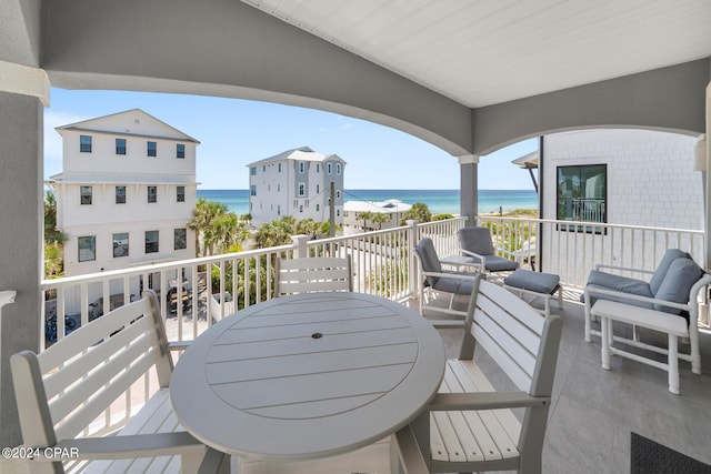 93 Emerald Cove Ln, Inlet Beach, FL 32461 - balcony with outdoor dining area and a water view