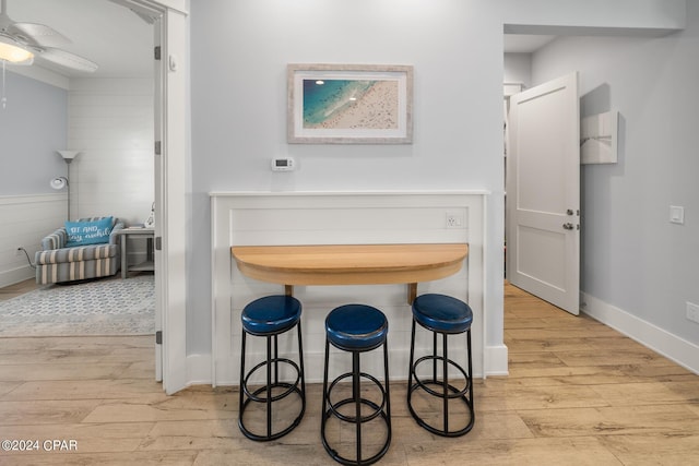 93 Emerald Cove Ln, Inlet Beach, FL 32461 - dining area featuring hardwood / wood-style flooring and baseboards