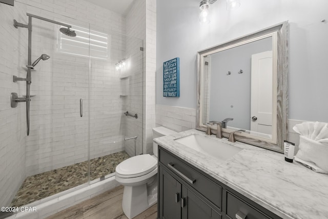 93 Emerald Cove Ln, Inlet Beach, FL 32461 - bathroom featuring a shower stall, toilet, and vanity