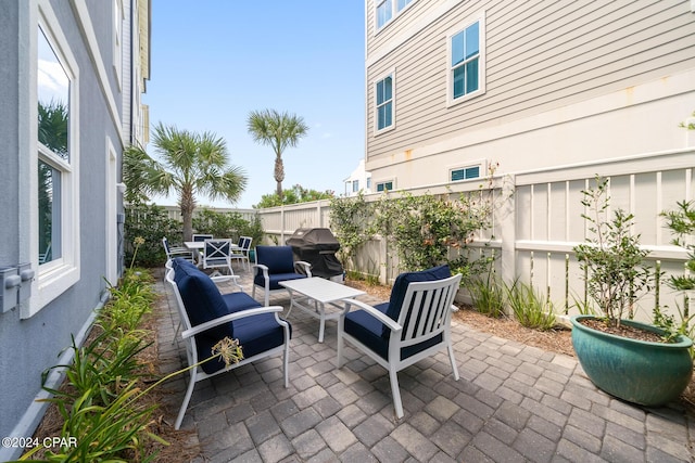 93 Emerald Cove Ln, Inlet Beach, FL 32461 - view of patio with grilling area, a fenced backyard, and outdoor lounge area