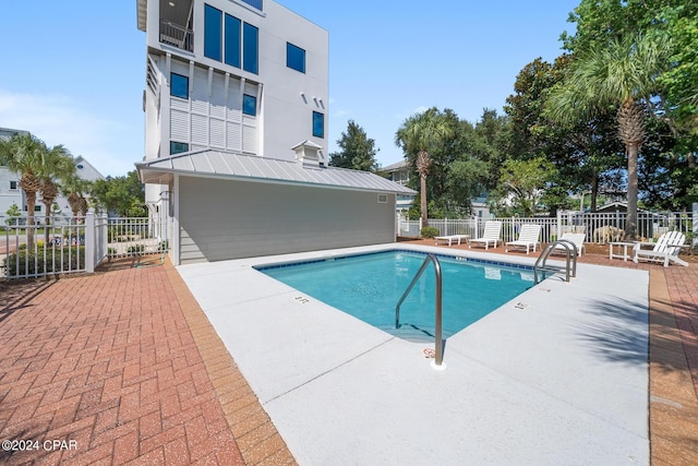 93 Emerald Cove Ln, Inlet Beach, FL 32461 - community pool with a patio and fence