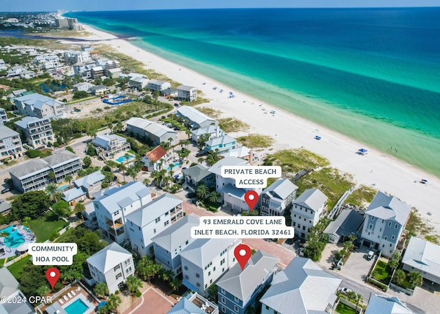 aerial view with a view of the beach and a water view