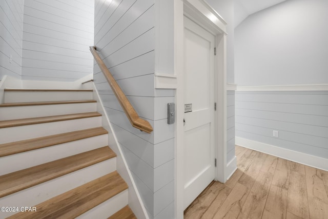 93 Emerald Cove Ln, Inlet Beach, FL 32461 - staircase featuring wood finished floors and baseboards