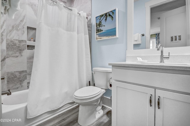 full bathroom featuring vanity, toilet, and shower / bath combo