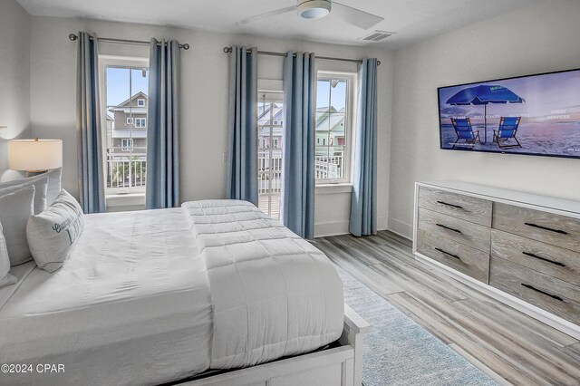 bedroom featuring ceiling fan and light wood-type flooring