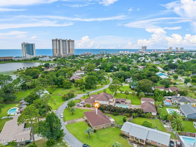 birds eye view of property featuring a water view