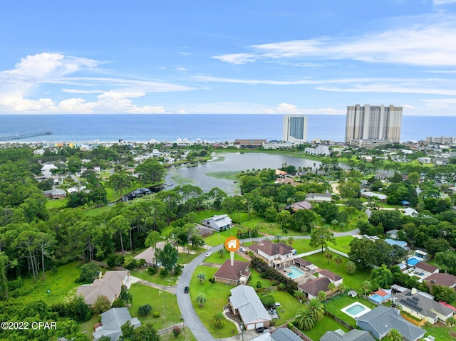 birds eye view of property featuring a water view