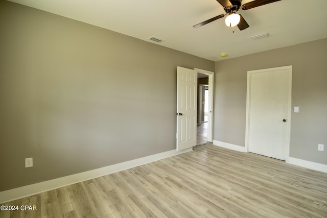 interior space with light hardwood / wood-style flooring and ceiling fan