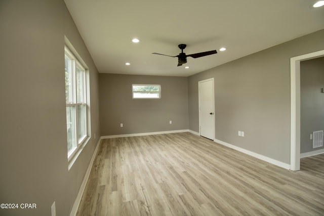 unfurnished bedroom with light hardwood / wood-style flooring and ceiling fan