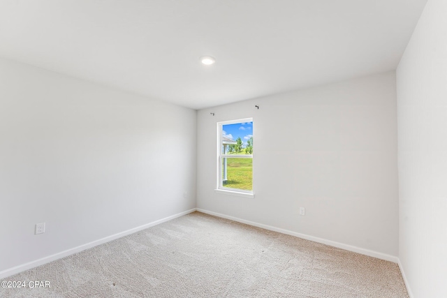 view of carpeted spare room