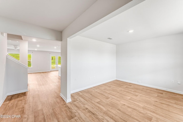 empty room with light hardwood / wood-style floors