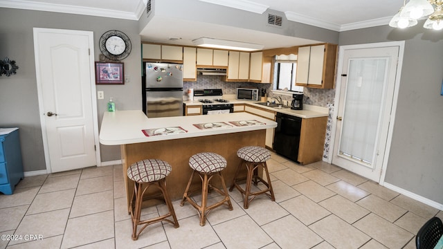 kitchen with sink, appliances with stainless steel finishes, crown molding, and backsplash