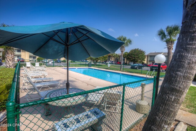 view of pool featuring a patio area