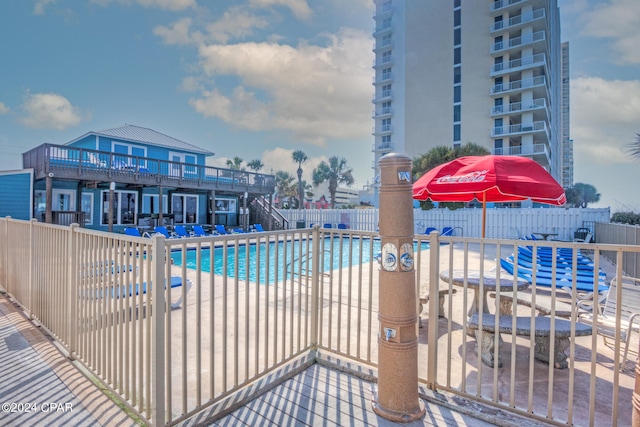 view of pool featuring a patio area