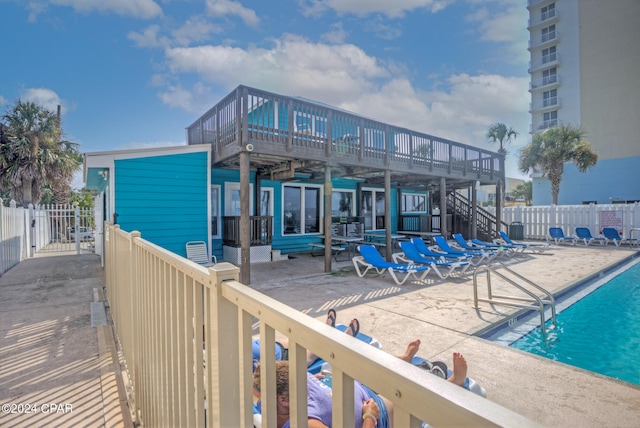 view of pool featuring a patio area