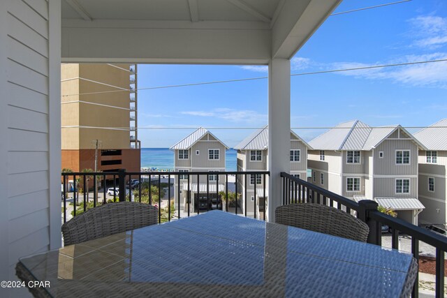 17674 Front Beach Rd Unit 10Units, Panama City Beach, FL 32413 - wooden deck with outdoor dining space and a water view