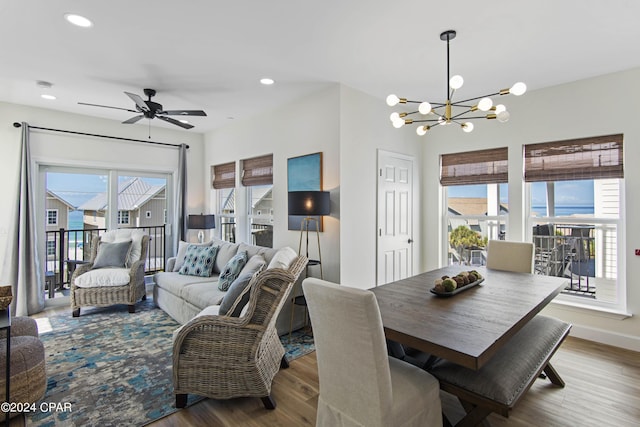 17674 Front Beach Rd Unit 10Units, Panama City Beach, FL 32413 - dining space with recessed lighting, ceiling fan with notable chandelier, and wood finished floors