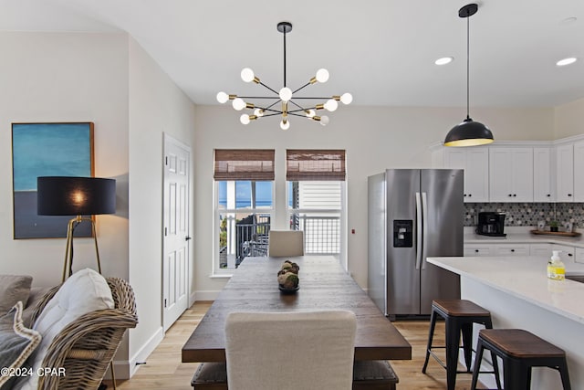17674 Front Beach Rd Unit 10Units, Panama City Beach, FL 32413 - dining room with recessed lighting, light wood-type flooring, and a chandelier
