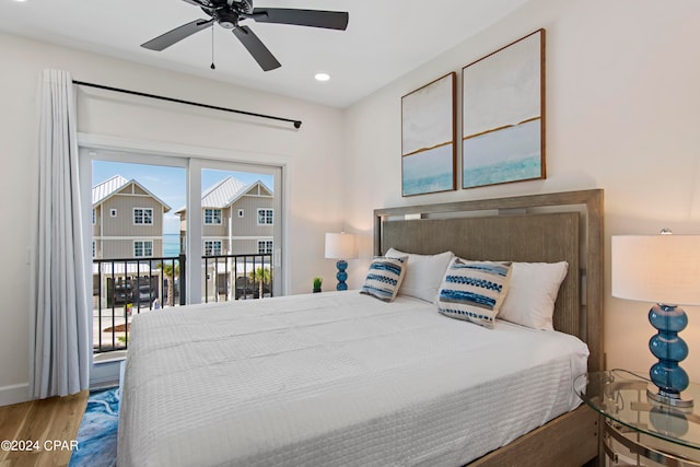 bedroom with wood-type flooring, access to exterior, and ceiling fan