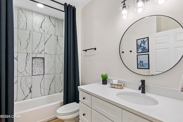 full bathroom with shower / bath combo, toilet, and vanity