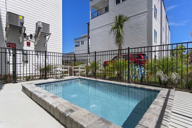 17674 Front Beach Rd Unit 10Units, Panama City Beach, FL 32413 - view of swimming pool with fence and a swimming pool