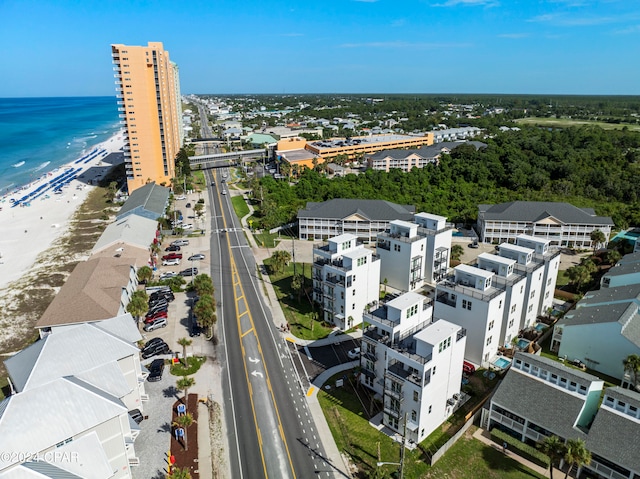 bird's eye view with a water view and a view of the beach