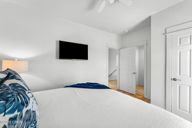 bedroom featuring ceiling fan and light wood-type flooring