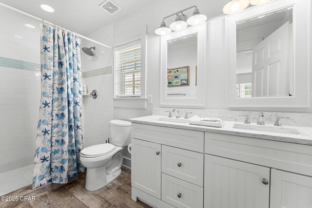 bedroom with hardwood / wood-style floors