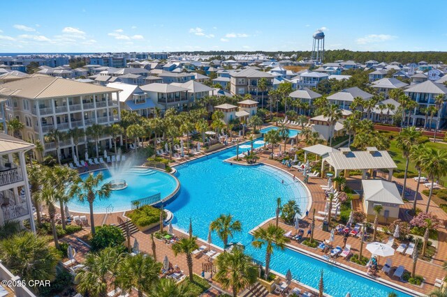 view of swimming pool featuring pool water feature