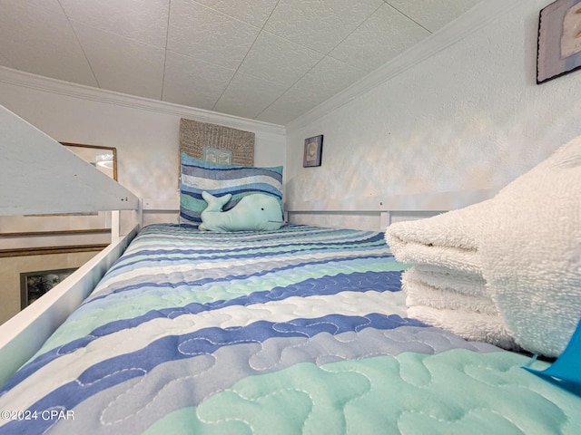 bedroom featuring ornamental molding