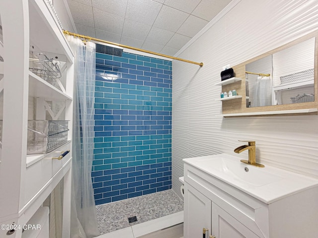 bathroom featuring vanity and a shower with shower curtain