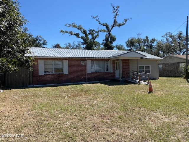 ranch-style house with a front yard