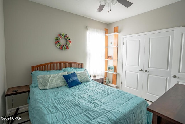 bedroom with ceiling fan and a closet