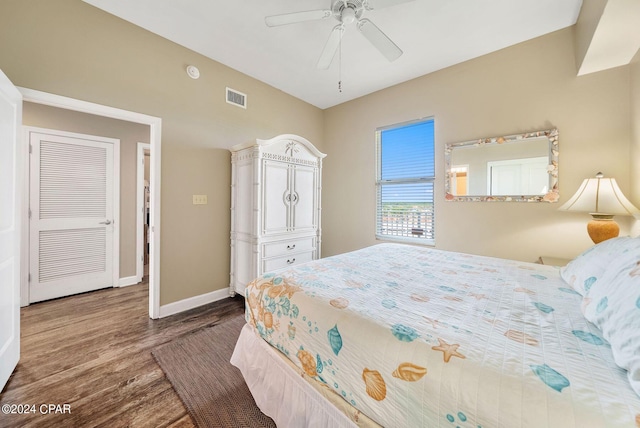 bedroom featuring ceiling fan and hardwood / wood-style flooring