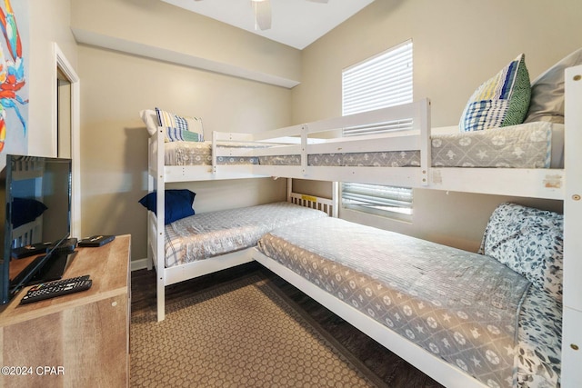 bedroom featuring ceiling fan and wood-type flooring