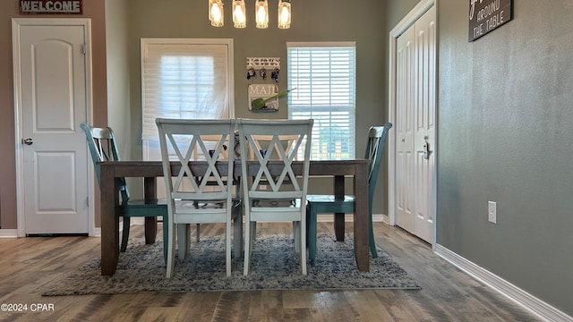 dining area featuring hardwood / wood-style floors