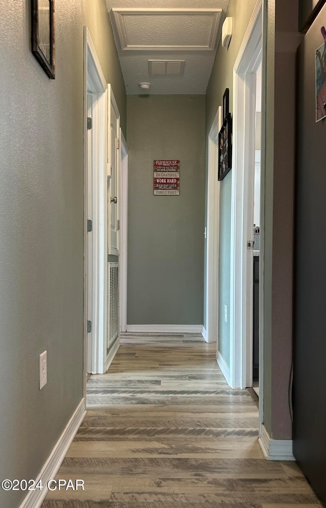 hall featuring hardwood / wood-style floors