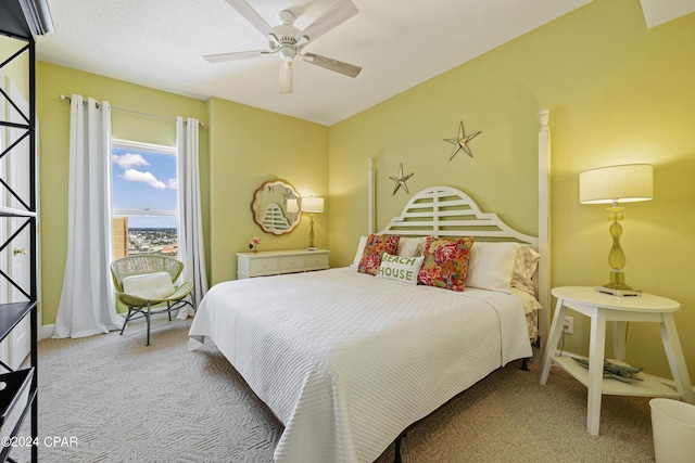 bedroom with carpet floors, baseboards, and a ceiling fan