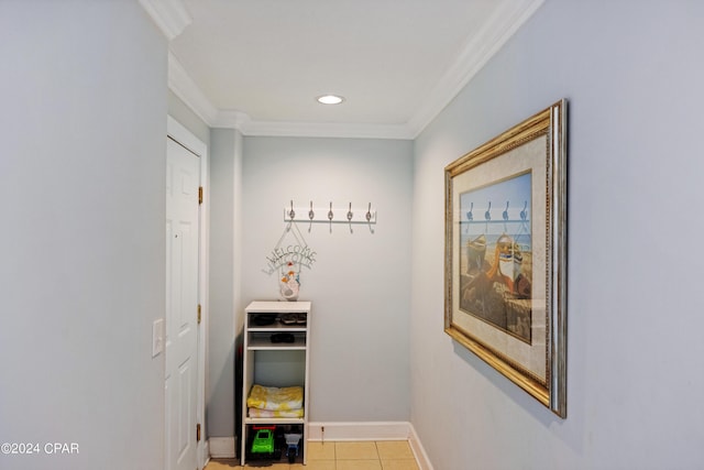 hall with light tile patterned flooring, baseboards, crown molding, and recessed lighting