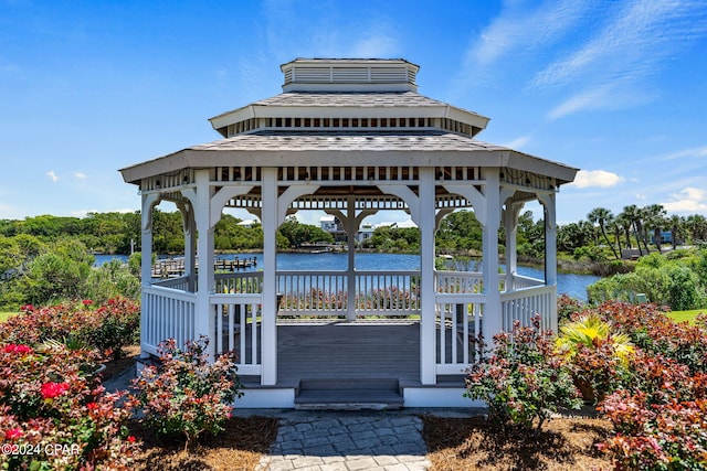 view of community featuring a gazebo and a water view