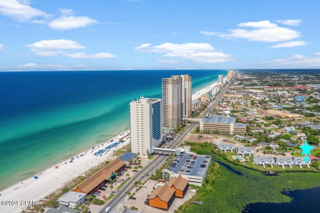 aerial view with a beach view and a water view