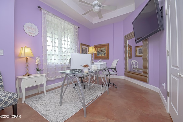 office area featuring ceiling fan and concrete flooring