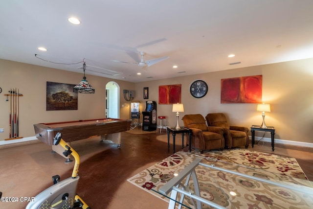 game room with ceiling fan, concrete flooring, and billiards