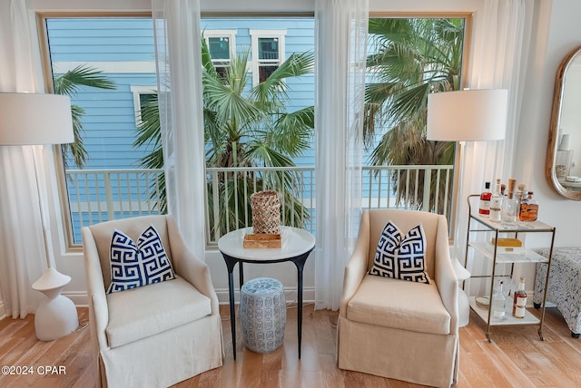 8715 Surf Dr Unit 201A, Panama City Beach, FL 32408 - living area featuring wood finished floors