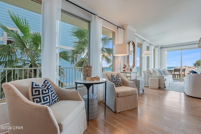 interior space with light hardwood / wood-style flooring and floor to ceiling windows