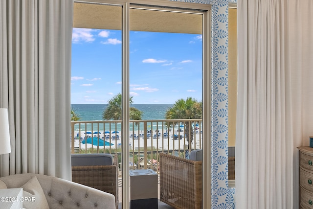 balcony featuring a water view