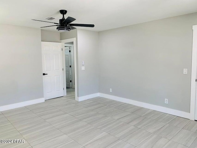 unfurnished room featuring ceiling fan